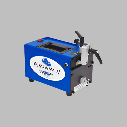Blue machine labeled 'Piranha II' on a white background